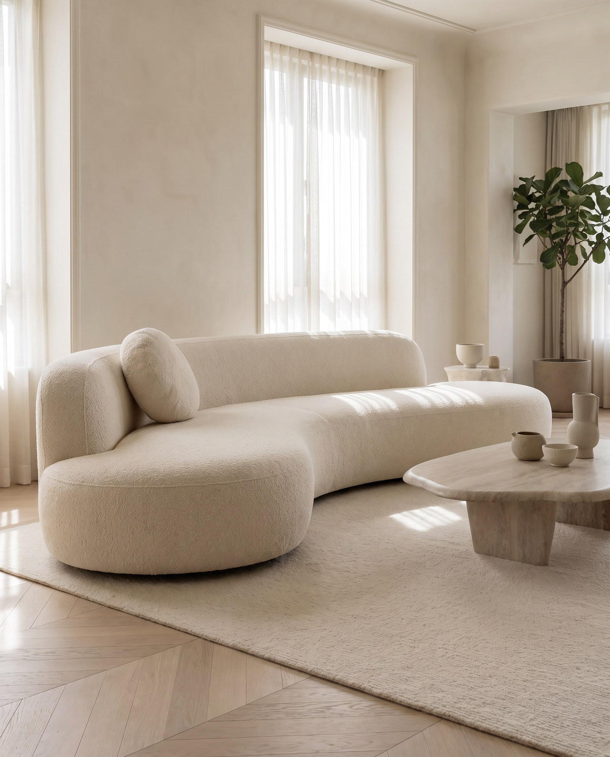 Mila Sculptural Bouclé Sofa in a warm contemporary living room